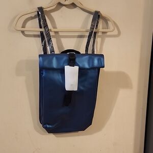 RAINS WATERPROOF LASER COLORED NWT  ROLLTOP MINI RUCKSAC